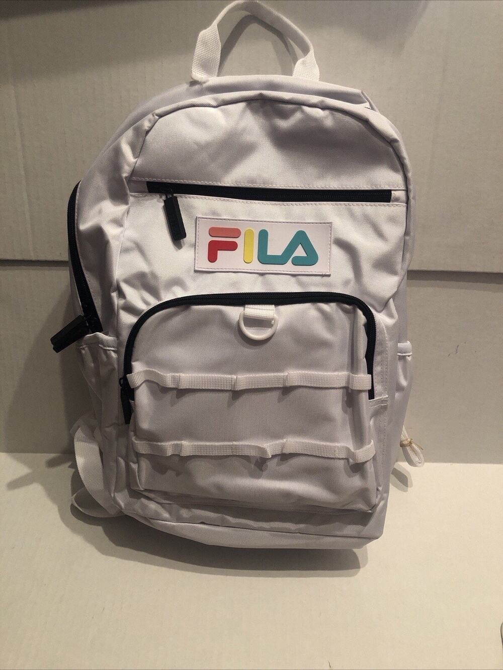 Fila Backpack white color with compartments Sz 16"x12"x6" BROKEN HAND STRAP READ